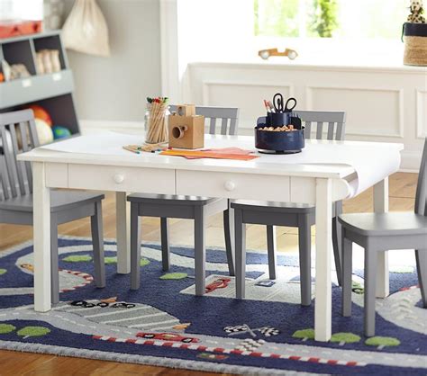 Pottery barn craft table - Craft Table Paper Roll 18". $19. $0. Pricing may vary at time of purchase. 1.800.993.4923. Give your kids a nearly endless surface for drawing and painting. Install our paper roll on our Carolina Craft Table and they’ll love to create big works of art alone or with friends. KEY PRODUCT POINTS • Roll is 75 feet long. 